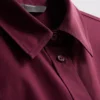 Camisa holgada de manga corta de algodón de primera calidad