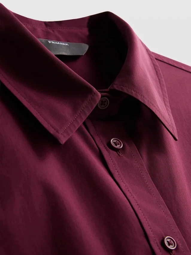 Camisa holgada de manga corta de algodón de primera calidad