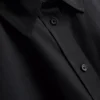 Camisa holgada de manga corta de algodón de primera calidad