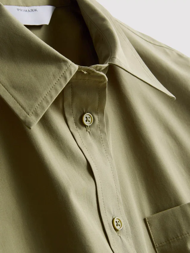 Camisa holgada de manga corta de algodón de primera calidad