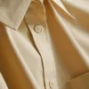 Camisa holgada de manga corta de algodón de primera calidad