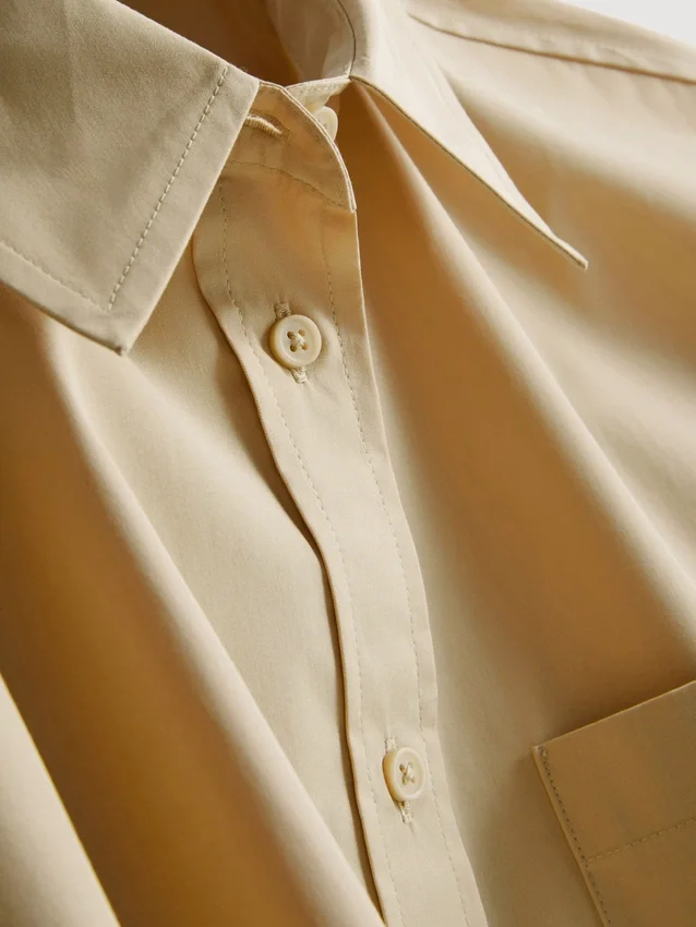 Camisa holgada de manga corta de algodón de primera calidad