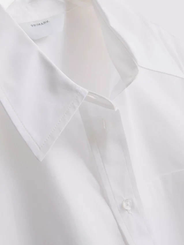 Camisa holgada de manga corta de algodón de primera calidad