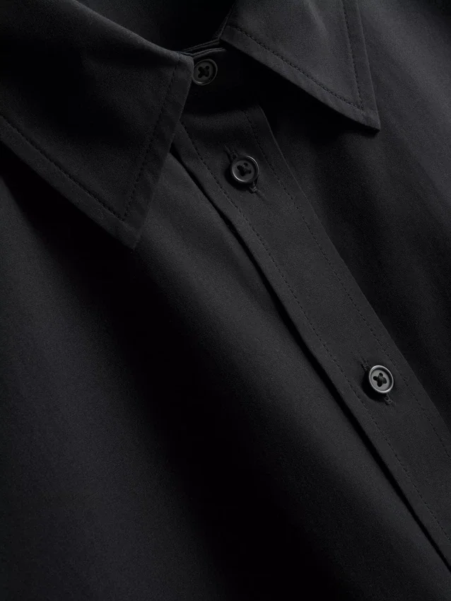 Camisa holgada de manga corta de algodón de primera calidad