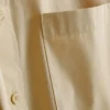 Camisa holgada de manga corta de algodón de primera calidad