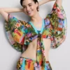 Camisas cortas con estampado tropical y lazo