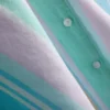 Camisas de pijama cortas a rayas en tonos pastel, ideales para relajarse