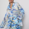 Camisas de playa de algodón estampadas con botones
