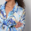 Camisas de playa de algodón estampadas con botones