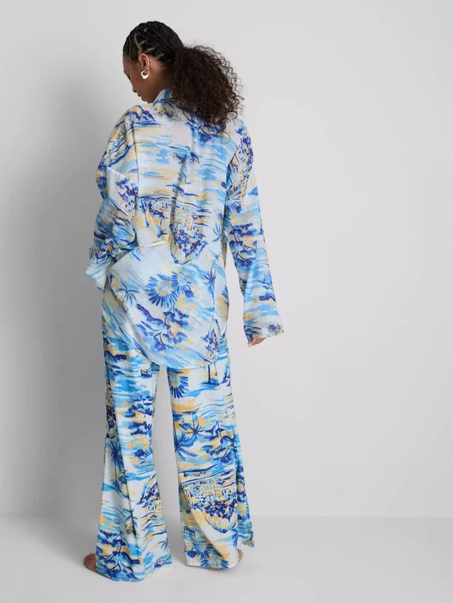 Camisas de playa de algodón estampadas con botones