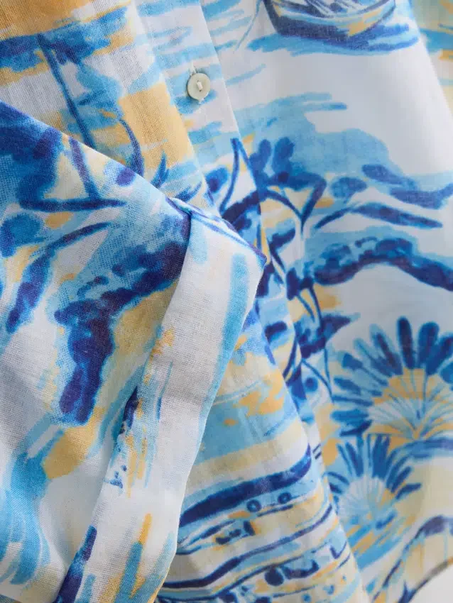 Camisas de playa de algodón estampadas con botones