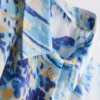 Camisas de playa de algodón estampadas con botones