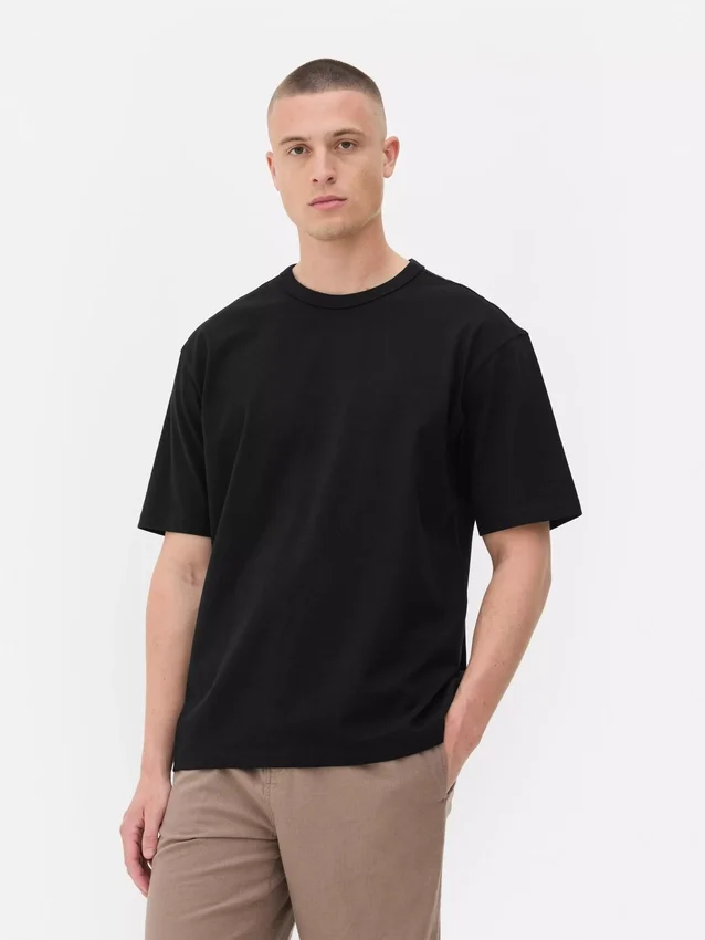 Camiseta de algodón de corte holgado con cuello ribeteado