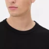 Camiseta de algodón de corte holgado con cuello ribeteado