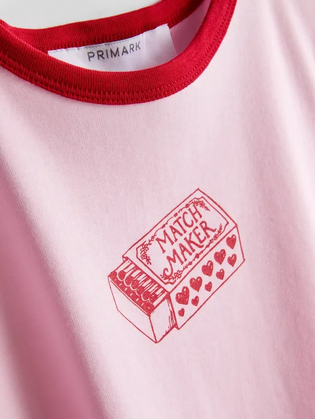 Camiseta de bebé de algodón estampada con cuello anillado