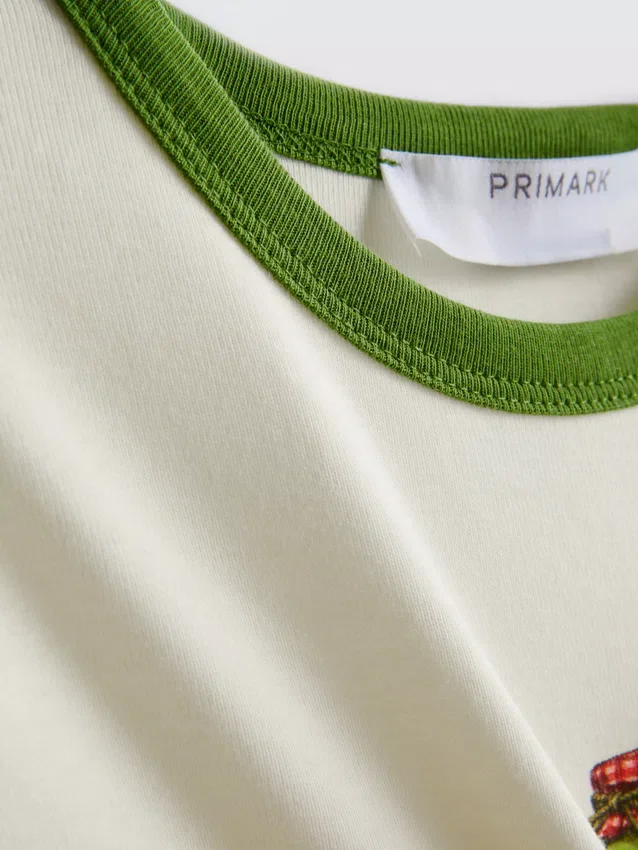 Camiseta de bebé de algodón estampada con cuello anillado
