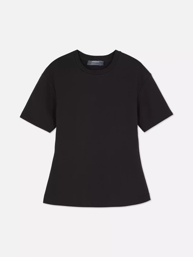 Camiseta de peso pesado con corte entallado