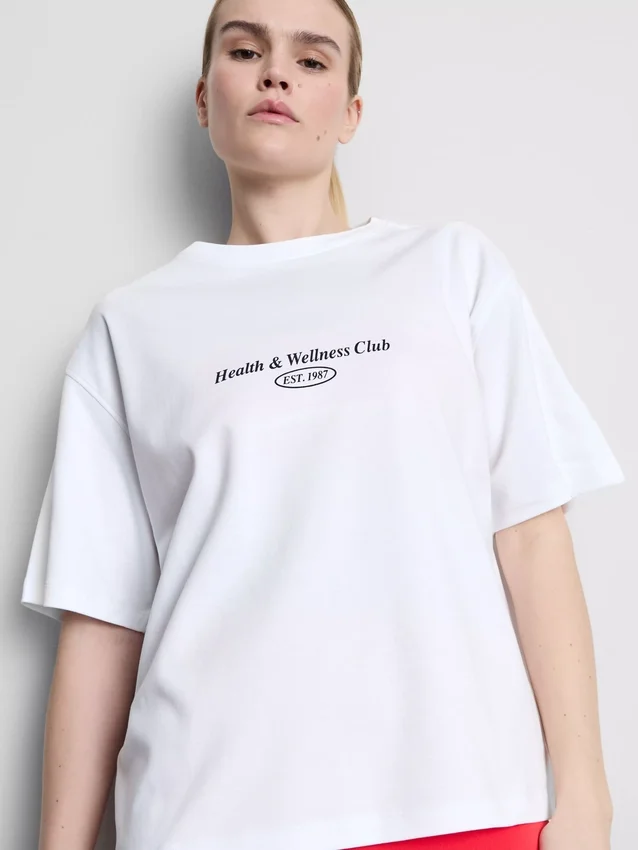 Camiseta deportiva holgada de algodón con diseño gráfico