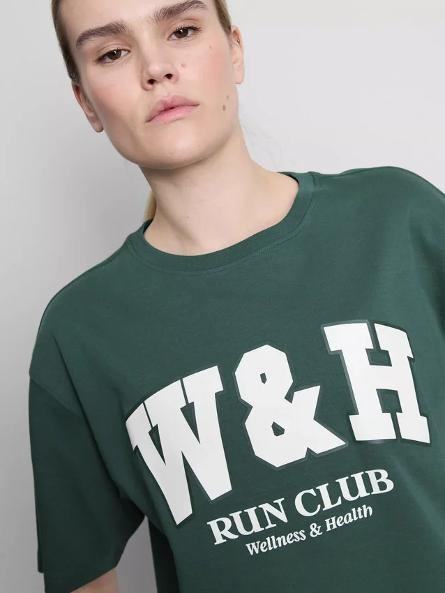 Camiseta deportiva holgada de algodón con diseño gráfico