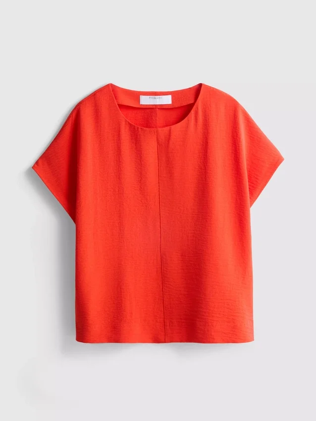 Camiseta holgada de cuello redondo con ventilación