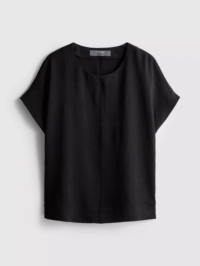 Camiseta holgada de cuello redondo con ventilación