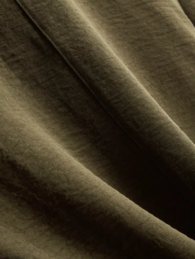Camiseta holgada de cuello redondo con ventilación