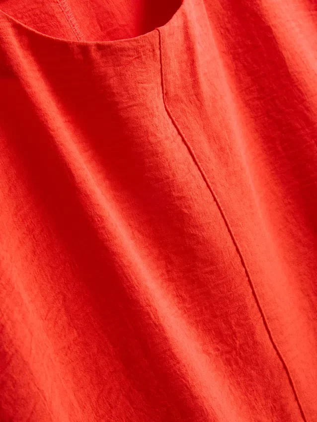 Camiseta holgada de cuello redondo con ventilación