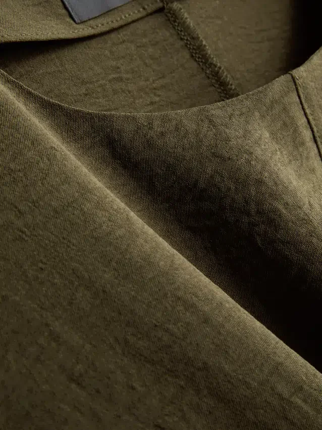 Camiseta holgada de cuello redondo con ventilación