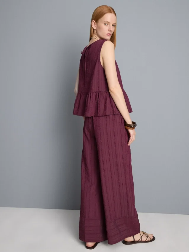 Camiseta sin mangas con dobladillo peplum a rayas