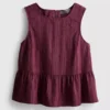 Camiseta sin mangas con dobladillo peplum a rayas