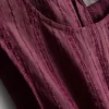Camiseta sin mangas con dobladillo peplum a rayas