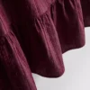 Camiseta sin mangas con dobladillo peplum a rayas