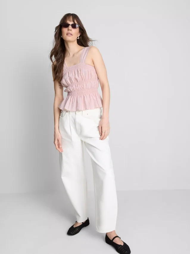 Camiseta sin mangas con dobladillo tipo peplum fruncido