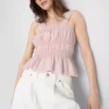 Camiseta sin mangas con dobladillo tipo peplum fruncido