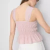 Camiseta sin mangas con dobladillo tipo peplum fruncido