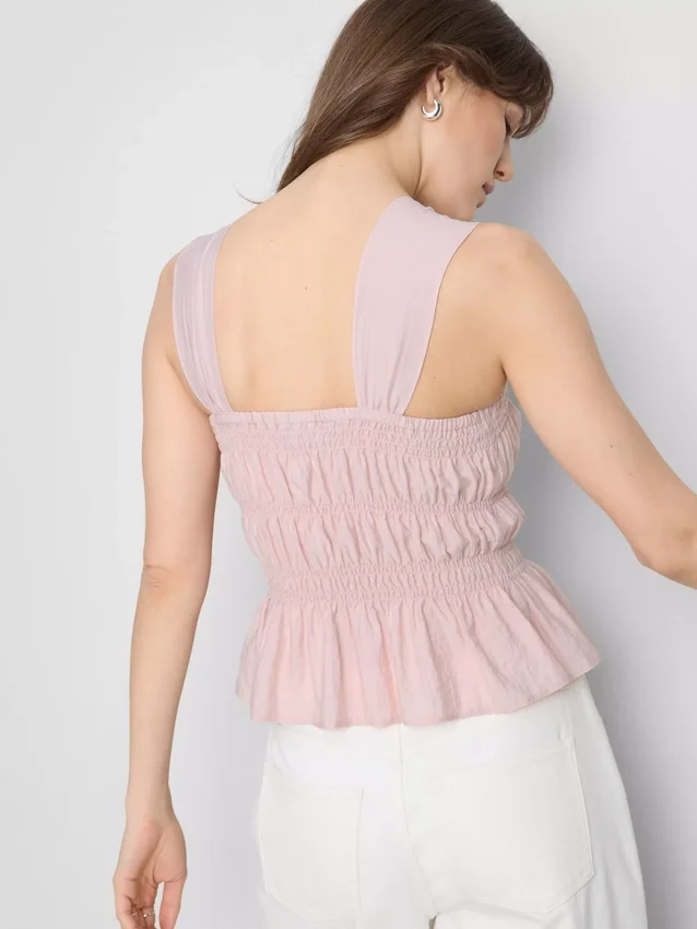 Camiseta sin mangas con dobladillo tipo peplum fruncido