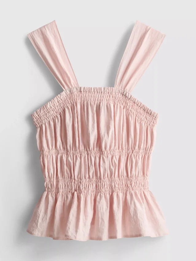 Camiseta sin mangas con dobladillo tipo peplum fruncido