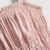 Camiseta sin mangas con dobladillo tipo peplum fruncido