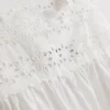 Camiseta sin mangas con inserto bordado