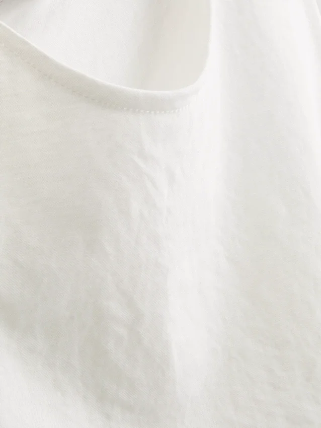 Camiseta sin mangas con lazo lateral texturizado