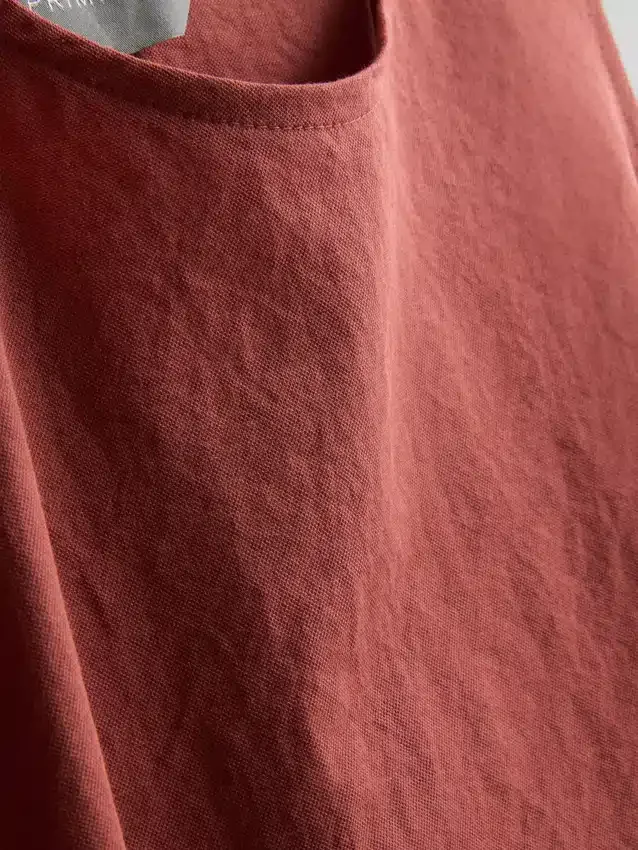 Camiseta sin mangas con lazo lateral texturizado