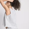 Camiseta sin mangas corta de denim de algodón con volantes