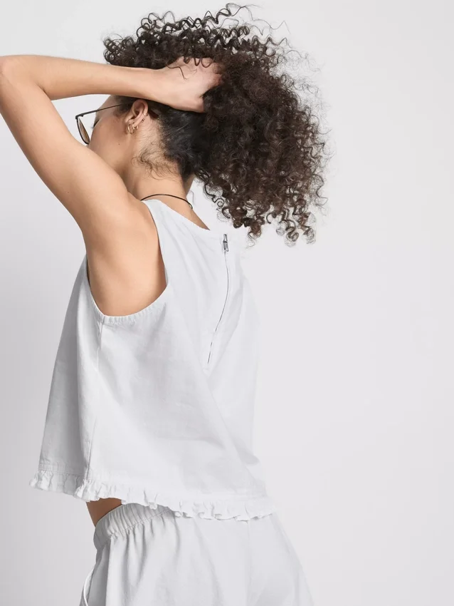 Camiseta sin mangas corta de denim de algodón con volantes