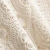 Camiseta sin mangas de crochet con lazo lateral