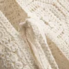 Camiseta sin mangas de crochet con lazo lateral