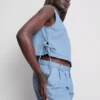 Camiseta sin mangas de mezclilla de algodón con lazos a los lados