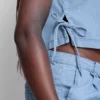 Camiseta sin mangas de mezclilla de algodón con lazos a los lados