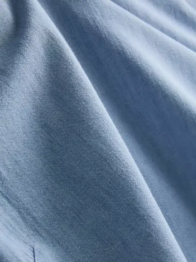 Camiseta sin mangas de mezclilla de algodón con lazos a los lados