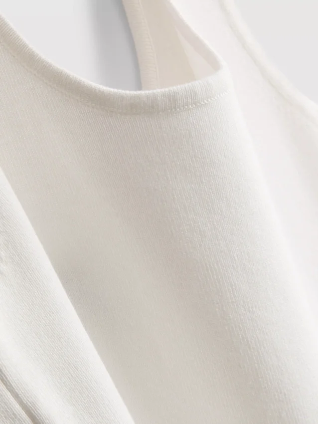 Camiseta sin mangas de punto definitiva