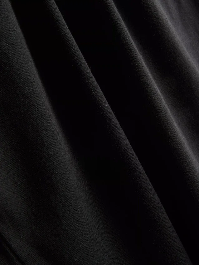 Camiseta sin mangas elástica imprescindible